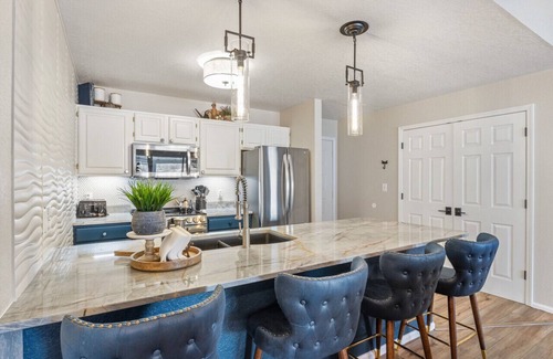 Village of Four Seasons Condo | Posh Penthouse-Top Floor, Waterfront, Pools, & Pickleball!