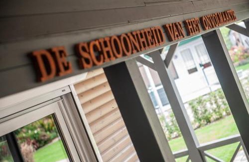 Geel Ski Chalet | Prachtige chalet Wabi Sabi aan het water!