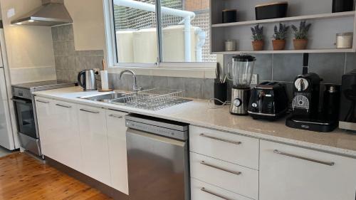 Pretty Beach House | 'Pretty Beach Bay Vista' by Accom Holidays
