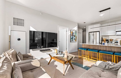 West Loop Apartment | Prime Location 2BR: Balcony, Restful Night