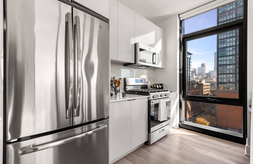 West Loop Apartment | Prime Location 2BR: Balcony, Restful Night