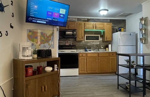 Mountain Iron Apartment | "Prime Location Stylish 1Bedroom with Hot Tub Access, across street from Legion