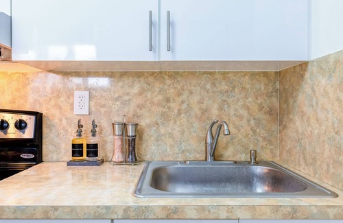 West Little Havana Apartment | Prime Miami Retreat - Sleeps 12 - 4 Bedrooms - 6 Beds- Parking & BBQ!