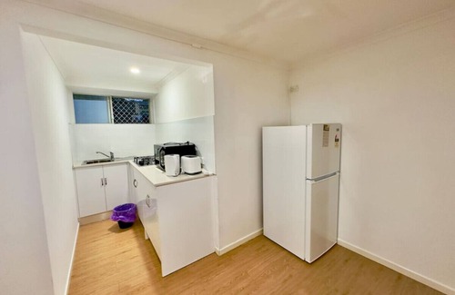 Macgregor Apartment | Prime1BR Near Transport & Retail
