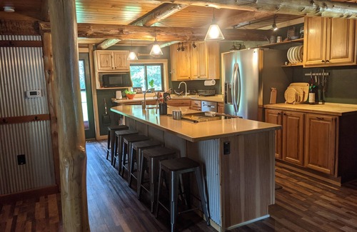 Dunbar Cabin | Private 3 BR 1.5 BA log cabin on 34 acres, driveway is 150' from ATV trail