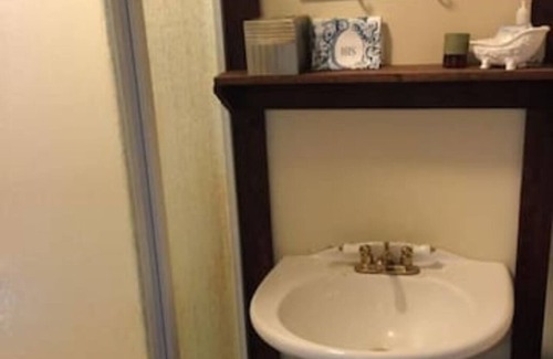 Pembine House | Private Colonial-themed room with shared bath and kitchenette
