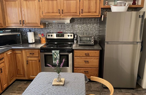 New Hill House | Private, cozy cottage, and beautiful country setting surrounded with pine trees.
