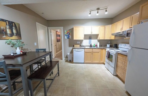 Grande Prairie Apartment | Private Cozy Suite | Full Kitchen | Smart TV | WIFI