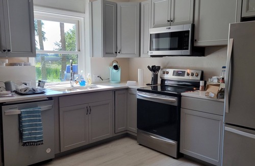 Brunswick Apartment | Private hot tub and seasonally heated pool.