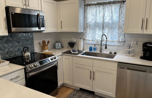 Manistee House | Private Hot Tub, Outdoor TV, near Downtown & Lake Michigan Beaches!