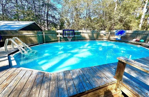 Apalachicola House | Private King Room with outdoor entrance, deck, and private bathroom.