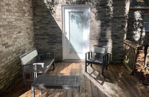 Apalachicola House | Private King Room with outdoor entrance, deck, and private bathroom.