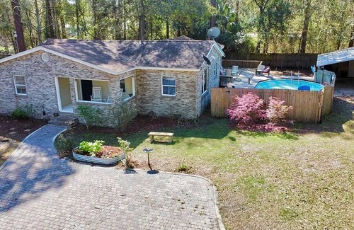 Apalachicola House | Private King Room with outdoor entrance, deck, and private bathroom.