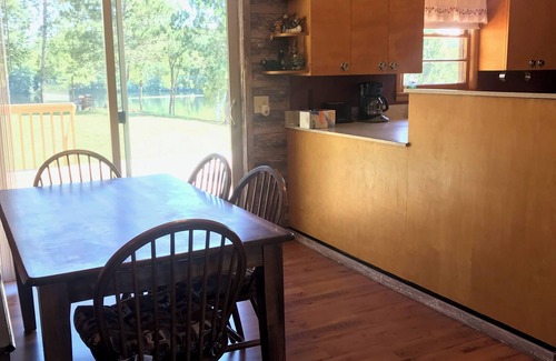 Crystal Falls House | Private Lake House on 16 +/- wooded acres, 80 + acre lake, 55 foot deep!