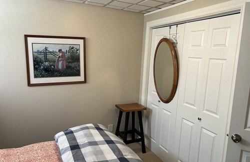Valley Ridge Bed & Breakfast | Private, quiet, cozy developed basement living area with 2 beds.