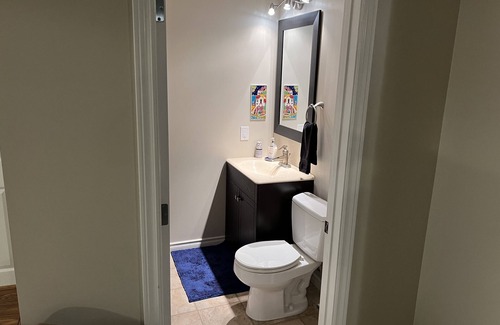 Valley Ridge Bed & Breakfast | Private, quiet, cozy developed basement living area with 2 beds.