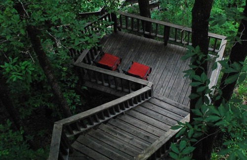 Caddo Gap RV Rental | Private River Tent Camping with Kayaks & Outdoor Bathhouse! Pet friendly!