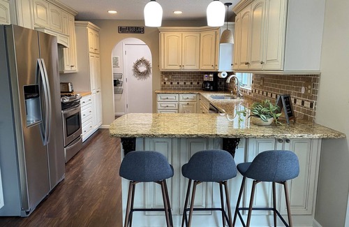 Grand Rapids House | Private sand beach, screen porch, spacious rooms, paddle boards and more!