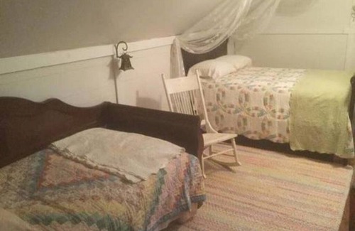 Pembine Bed & Breakfast | Private Victorian Cottage-themed room with shared baths/ kitchenette
