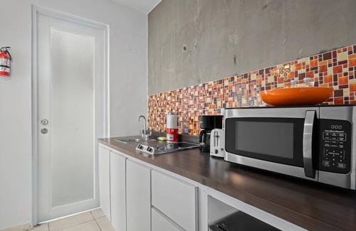 Punta Las Marias Apartment | Puerto Rico Beachside Rental w Pool Otium Rentals