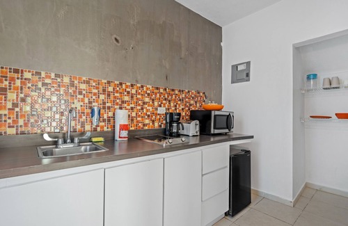 Punta Las Marias Apartment | Puerto Rico Beachside Rental w Pool Otium Rentals
