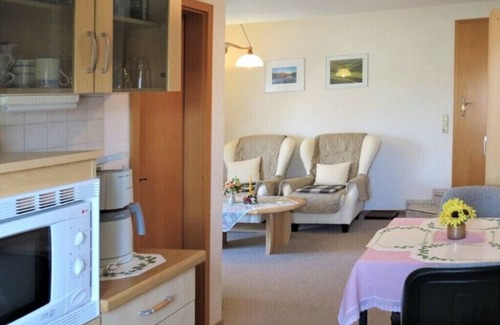 Busumer Deichhausen Apartment | Puls-ferienwohnungen 300m vom Badestrand. Der Erholungsort ist Kurtaxe Frei