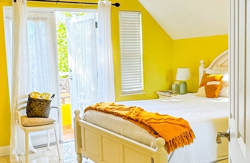 West Bay Bed & Breakfast | Pure Bliss Hibiscus Room at Cayman's Award Winning Shangri-La Bed & Breakfast