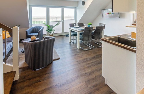 Neßmersiel Apartment | "Pure relaxation: Modern Waterkant vacation apartment with far-reaching views and comfort!"