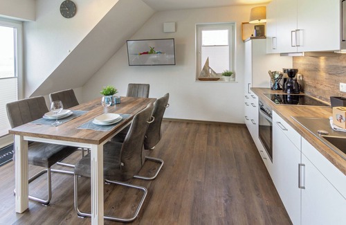 Neßmersiel Apartment | "Pure relaxation: Modern Waterkant vacation apartment with far-reaching views and comfort!"