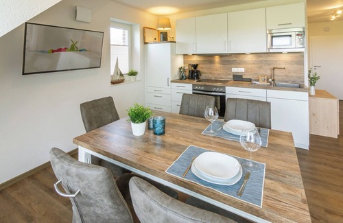 Neßmersiel Apartment | "Pure relaxation: Modern Waterkant vacation apartment with far-reaching views and comfort!"