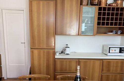 Brunate Apartment | Purple White Apartment