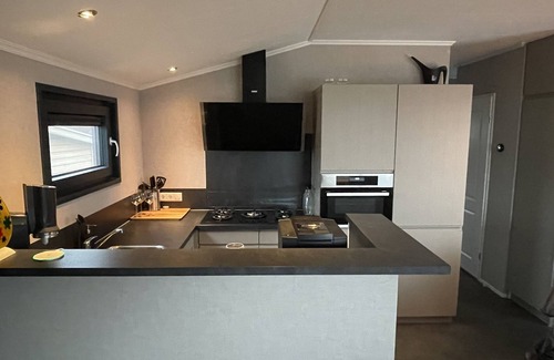 Eernewoude Ski Chalet | PUUR Eernewoude luxury cabin on open water in the Alde Feanen