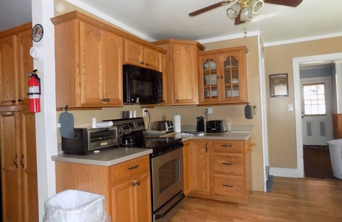 Freehold House | Quaint 1890's farmhouse remodeled maintaining its charm, ambiance & character.