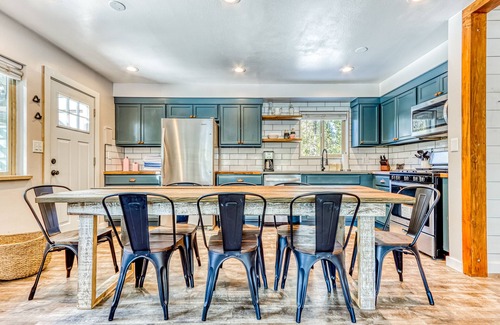 Three Rivers House | Quaint, riverfront home with woodstove, patio, deck, board games & washer/dryer