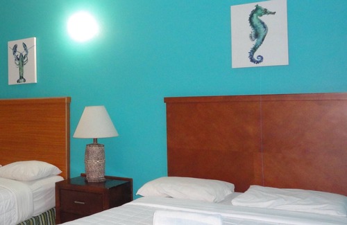 Buccoo Hotel | Queen room at Bellissimo