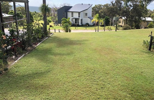 Orchid Beach House | Ques R & R at Orchid Beach. Water views with sea breeze. Relaxing Holiday House.