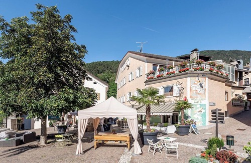 Muhlbach Apartment | Quiet and modern vacation oasis in the middle of the village with dream views, garden & pool