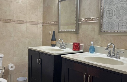Bahamas Terrace House | Quiet getaway near Xanadu Beach, Freeport with Central Air, WiFi & free parking.