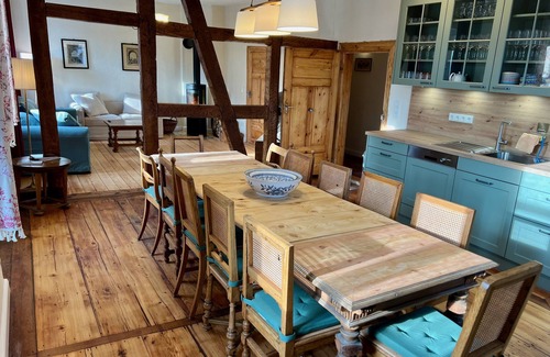 Zeitlofs Condo | Quiet vacation apartment with wood-burning stove, sauna, garden & terrace on historic estate. Castle courtyard