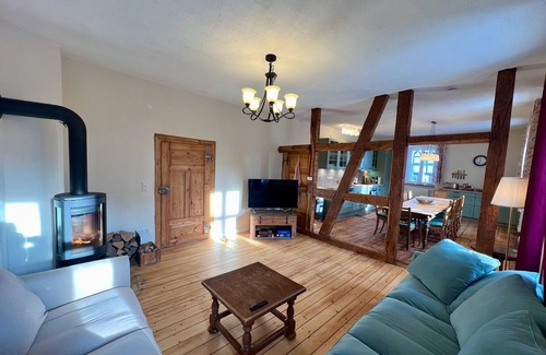 Zeitlofs Condo | Quiet vacation apartment with wood-burning stove, sauna, garden & terrace on historic estate. Castle courtyard
