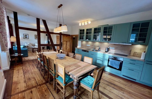 Zeitlofs Condo | Quiet vacation apartment with wood-burning stove, sauna, garden & terrace on historic estate. Castle courtyard