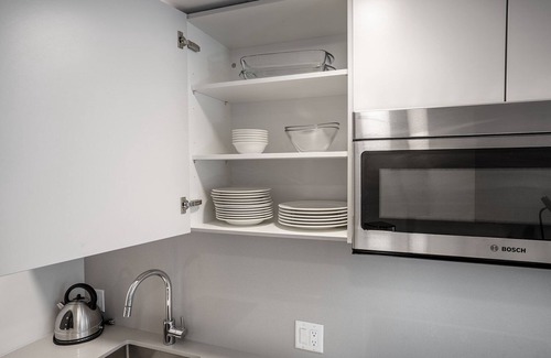 Mid-Cambridge Apartment | Rad Harvard Sq 1BR w/Balcony, near Shops & Campus, by Blueground