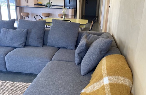 Raglan House | Raglan. A new treat on Rangitahi peninsula watching Raglan at its best.