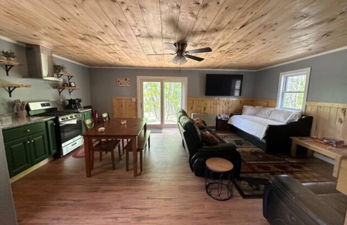 Dexter Cabin | Rail Trail Retreat! Recently remodeled cozy home on Snowmobile/ATV Trail!