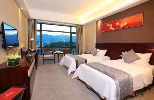 Xinluo District Hotel | Ramada Longyan