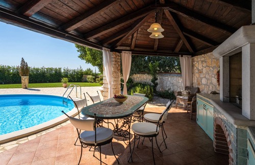 Mofardini Villa | Recharge your soul at this romantic stone villa with pool, garden & sunset view