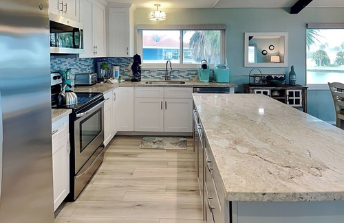 Jamaica Beach House | Reel Paradise | Pet Friendly, Waterfront, Pool!
