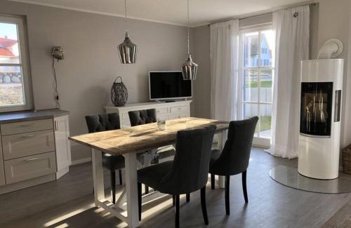 Gross Schwansee House | Reetdachhaus Seasons mit Kamin & Sauna