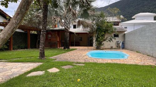 Centro House | Refúgio a poucos passos da Praia de Guaecá