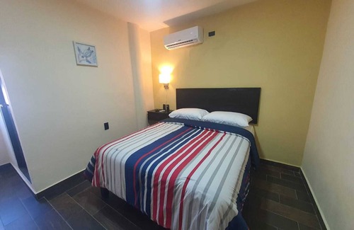 Ciudad Madero Hotel | Refugio Acolchado: Habitaciones Dobles para Humanos y Peludos Compañeros